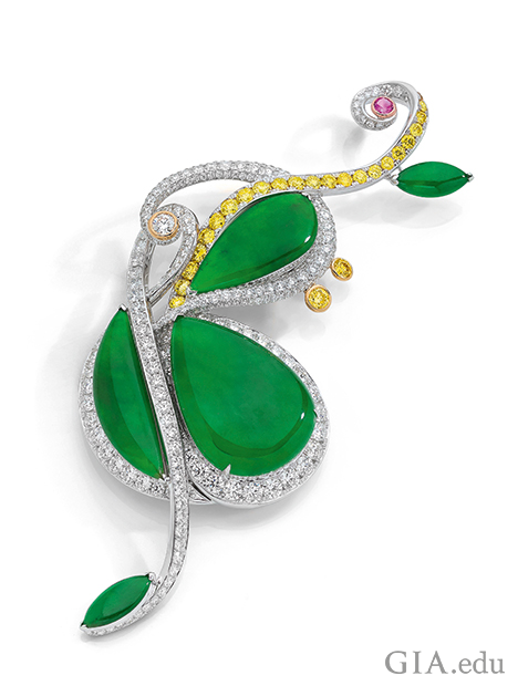 Brooch is styled as a cello, with the body in green jadeite that is framed in yellow and colorless diamonds. Brooch is styled as a cello, with the body in green jadeite that is framed in yellow and colorless diamonds.